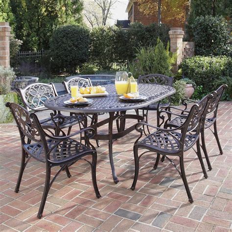 Nick 7-Piece Brown Wicker Patio Dining Set with Tan Cushions. . Lowes outdoor dining set